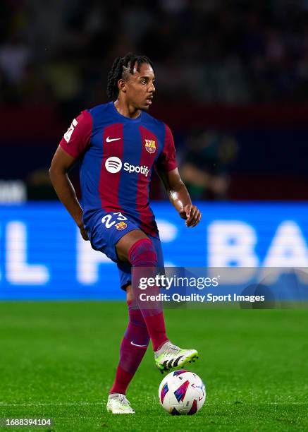 Jules Kounde of FC Barcelona with the ball during the LaLiga EA Sports match between FC Barcelona and Real Betis at Estadi Olimpic Lluis Companys on...