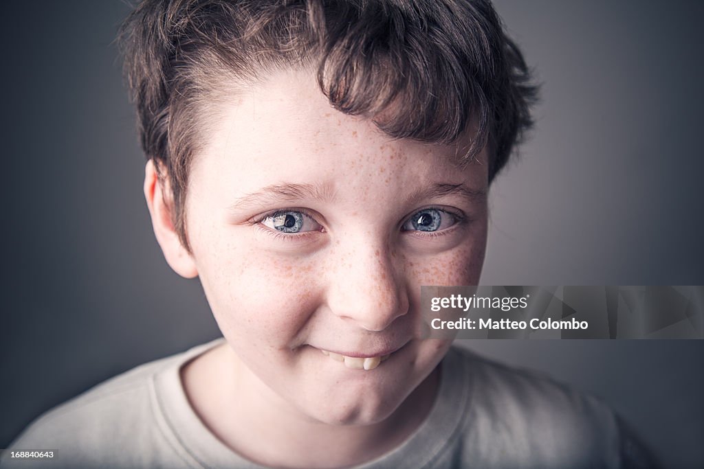 Child making funny smile