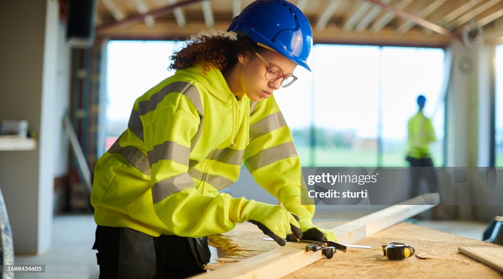 Female apprentice carpenter