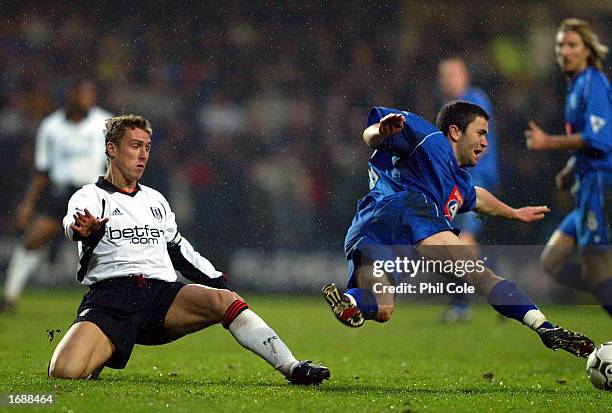 Andy Melville of Fulham tackles Damien Johnson of Birmingham City during the FA Barclaycard Premiership match between Fulham and Birmingham City at...