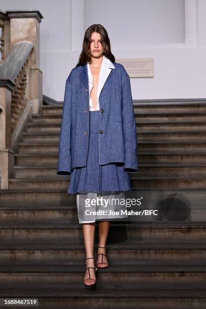 Model walks the runway at the Emilia Wickstead show during London Fashion Week September 2023 at the Royal Academy of Arts on September 18, 2023 in...