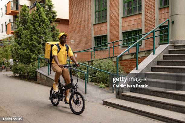 African Delivery Rider African Delivery Rider Photos and Premium High Res Pictures - Getty Images