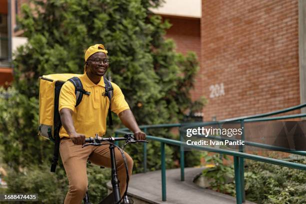 African Delivery Rider African Delivery Rider Photos and Premium High Res Pictures - Getty Images