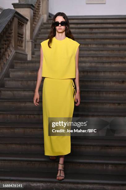 Model walks the runway at the Emilia Wickstead show during London Fashion Week September 2023 at the Royal Academy of Arts on September 18, 2023 in...