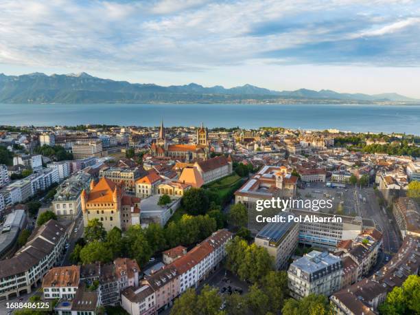 aerial view of lausanne city at sunrise, gothic cathedral, old town rooftops, and lake geneva, switzerland - geneva skyline ストックフォトと画像