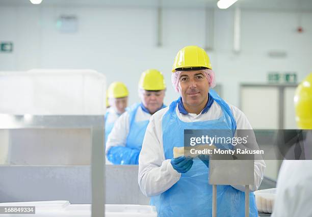 Food Factory Operator Smiling Food Factory Worker Photos and Premium High Res Pictures ...