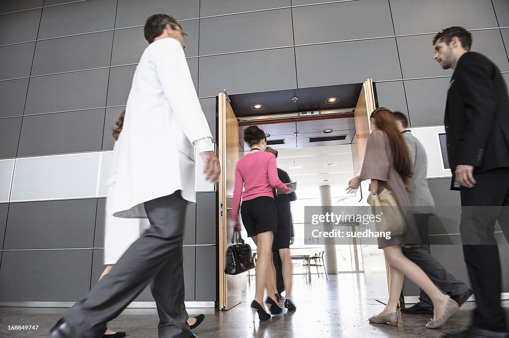 Business people and doctors in office