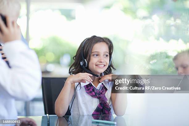 children playing business people at desk - rf business stock-fotos und bilder