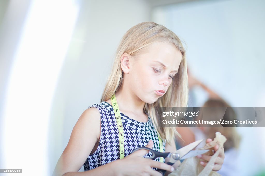 Girl playing fashion designer