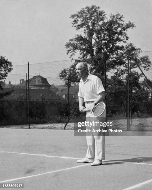 Czech politician Edvard Benes, president of Czechoslovakia, wearing his tennis whites as grabs a few sets at his official residence in Hradcany Hill,...