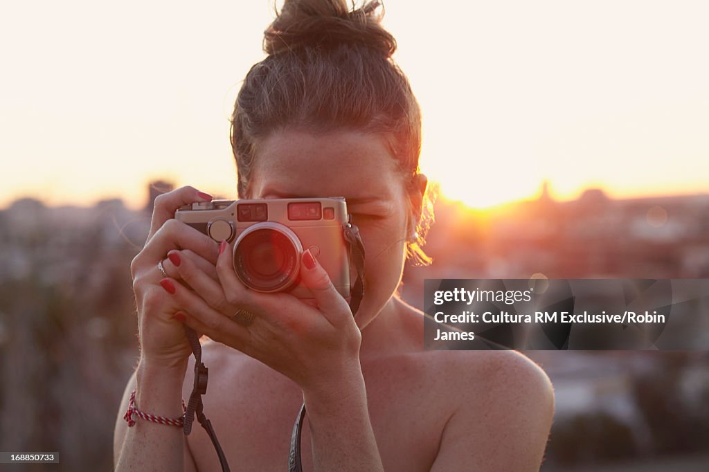 Close up of woman taking pictures