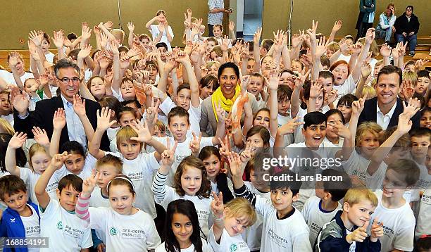 Helmut Sandrock, General Secretary of the German Football Association , Steffi Jones, director of German Football Association , and Oliver Bierhoff,...