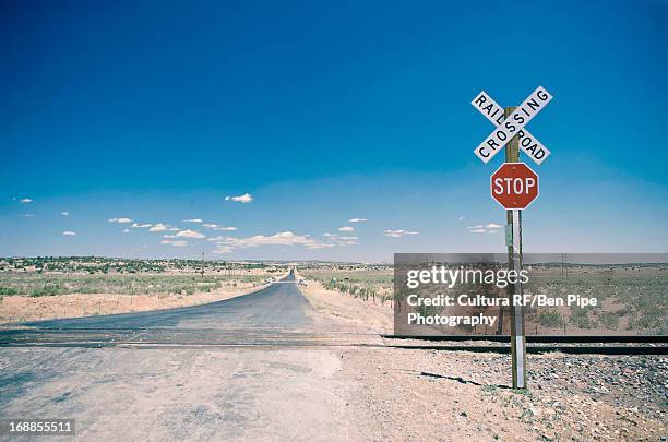 railroad crossing in new mexico, usa - railway crossing stock pictures, royalty-free photos & images