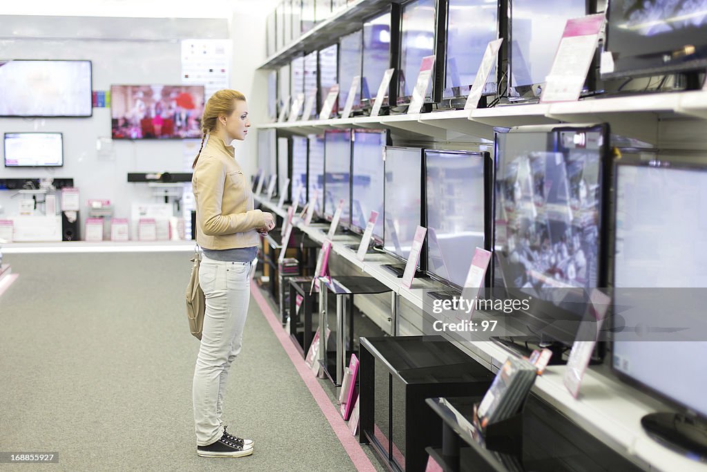 Woman buys the TV.