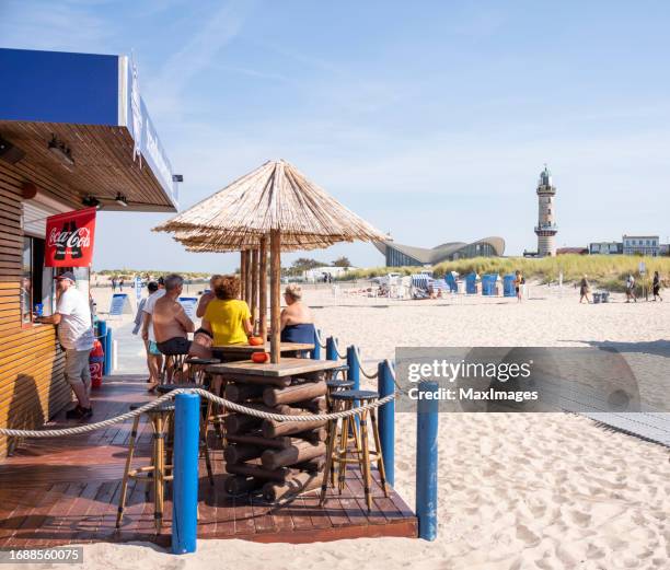 rostock warnemünde beach bar tourists summer - europa mythological character bildbanksfoton och bilder