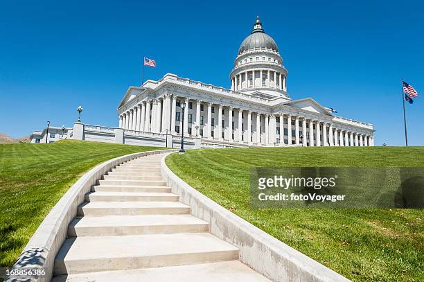 state capitol building stars and stripes salt lake city utah - salt lake city stock pictures, royalty-free photos & images