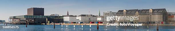 copenhagen harbour waterfront panorama theatres warehouses denmark - de kongelige teater stock pictures, royalty-free photos & images