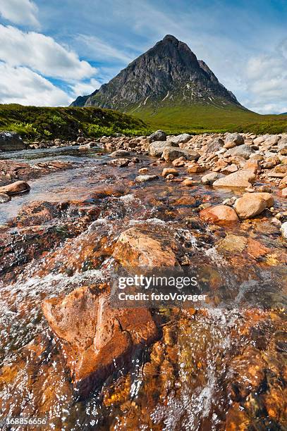 highland wilderness stream dramatic mountain peak glencoe scotland - silentfoto heather stock pictures, royalty-free photos & images