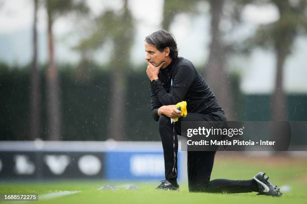 Head Coach Simone Inzaghi of FC Internazionale looks on during the FC Internazionale training session at Suning Training Centre at Appiano Gentile on...