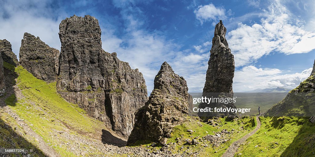 Scotland child exploring mountain pinnacles Isle of Skye