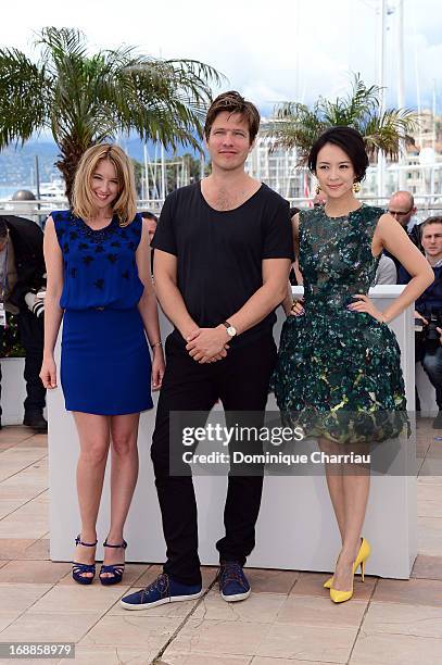 Actress Ludivine Sagnier, director Thomas Vinterberg and actress Zhang Ziyi attend the photocall for the Jury for the 'Un Certain Regard' competition...