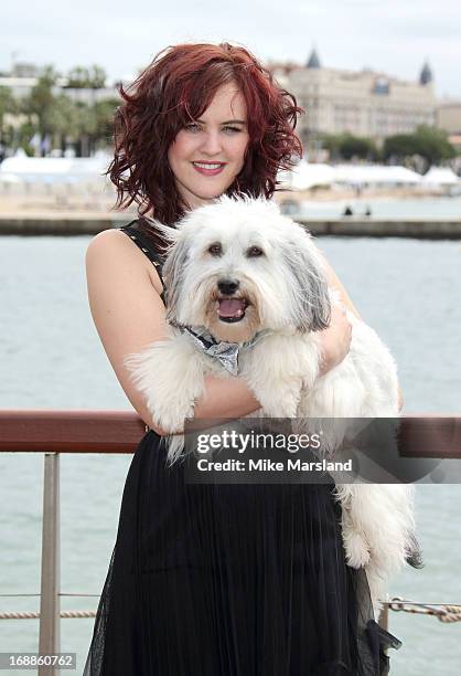 Ashleigh Butler and Pudsey attend the photocall for 'Pudsey: The Movie' at The 66th Annual Cannes Film Festival on May 16, 2013 in Cannes, France.