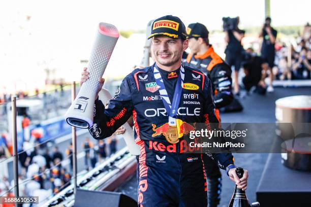 Max Verstappen of Netherlands, Oracle Red Bull Racing, portrait celebrates the victory at the podium during the Formula 1 Lenovo Grand Prix of Japan...