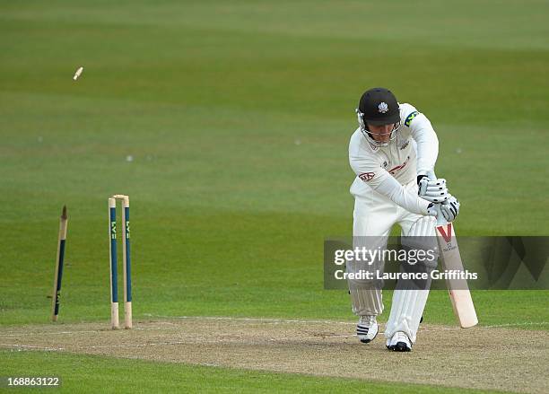 Jason Roy of Surrey has his off-stump removed as he is bowled by Luke Fletcher of Nottinghamshire during day two of the LV County Championship...