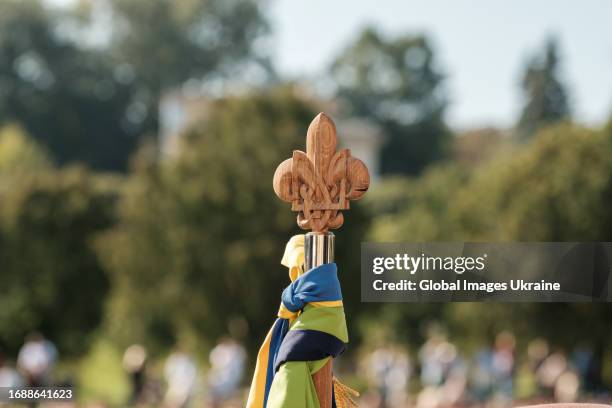 Official badge of the Plast scouts made of wood is seen during the opening of the Plast study year on September 17, 2023 in Lviv, Ukraine. Plast is a...