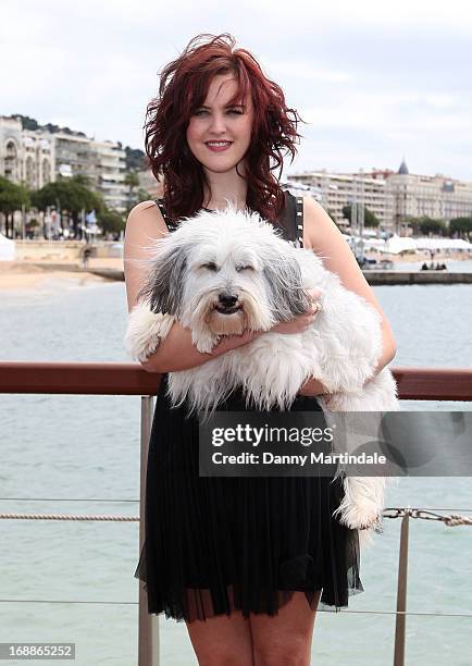 Ashleigh Butler and Pudsey attend the photocall for 'Pudsey:The Movie' at The 66th Annual Cannes Film Festival on May 16, 2013 in Cannes, France.
