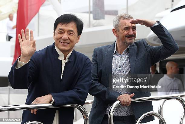 Jackie Chan and director Sam Fell attend the photocall for 'Skiptrace' at The 66th Annual Cannes Film Festival on May 16, 2013 in Cannes, France.