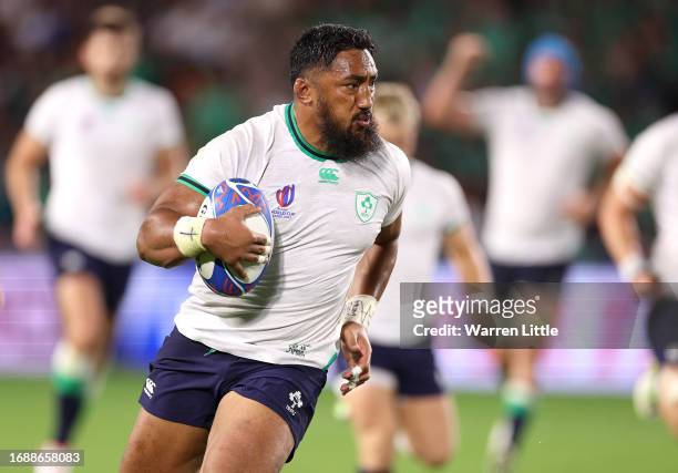 Bundee Aki of Ireland scores his team's sixth try during the Rugby World Cup France 2023 match between Ireland and Tonga at Stade de la Beaujoire on...