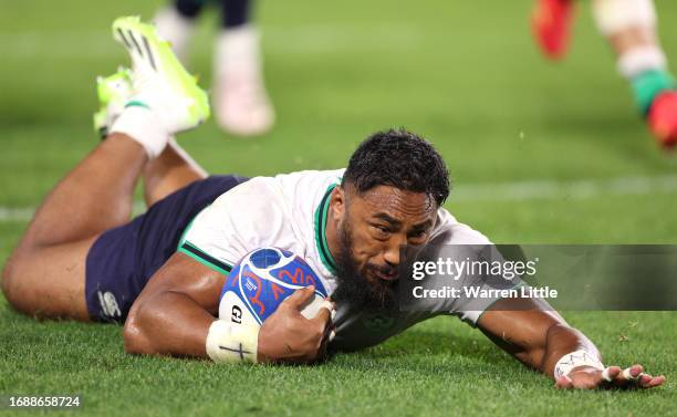 Bundee Aki of Ireland scores his team's sixth try during the Rugby World Cup France 2023 match between Ireland and Tonga at Stade de la Beaujoire on...