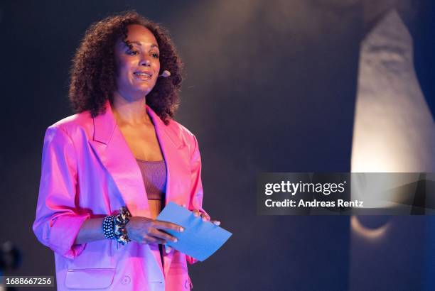 Host Milka Loff-Fernandes speaks during the People of Deutschland & Friends panel talk and concert at Kulturkirche Köln on September 17, 2023 in...