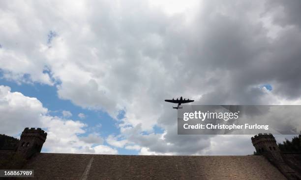 Lancaster bomber flies over Ladybower reservoir in the Derbyshire Peak District to mark the 70th anniversary of the World War II Dambusters mission...