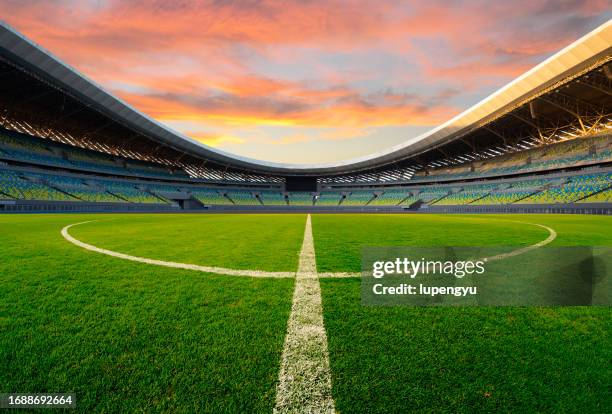 soccer field at sunset - china football stock pictures, royalty-free photos & images