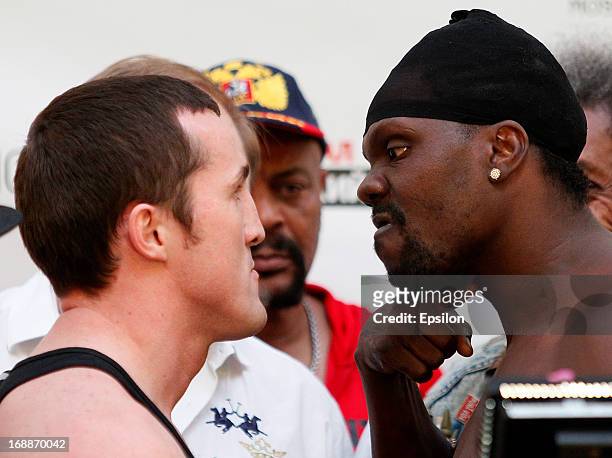 Denis Lebedev of Russia and Guillermo Jones of Panama face off during the official weigh-in for their WBA cruiserweight title bout at the...