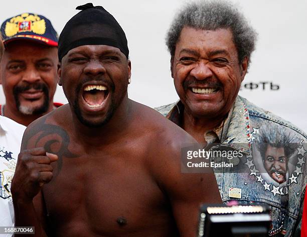 Guillermo Jones of Panama poses as promoter Don King looks on during the official weigh-in for his fight against Denis Lebedev of Russia for the WBA...