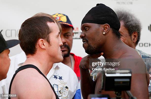 Denis Lebedev of Lebedev and Guillermo Jones of Panama face off during the official weigh-in for their WBA cruiserweight title bout at the...