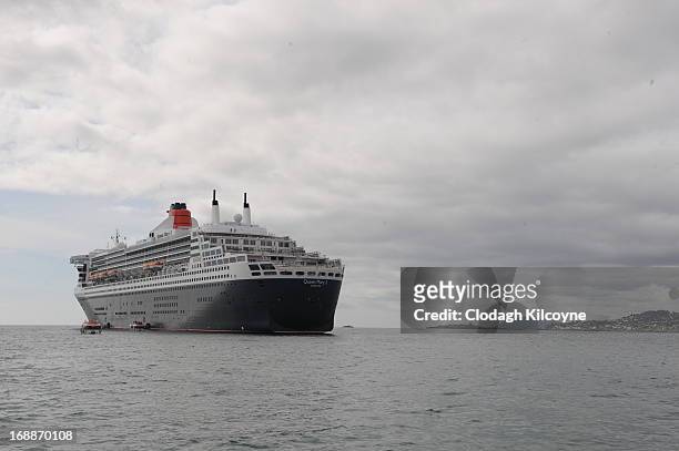 The RMS Queen Mary 2 is berthed one mile of the coast of Dublin on May 16, 2013 in Dublin Ireland The RMS Queen Mary 2, the world's largest ocean...