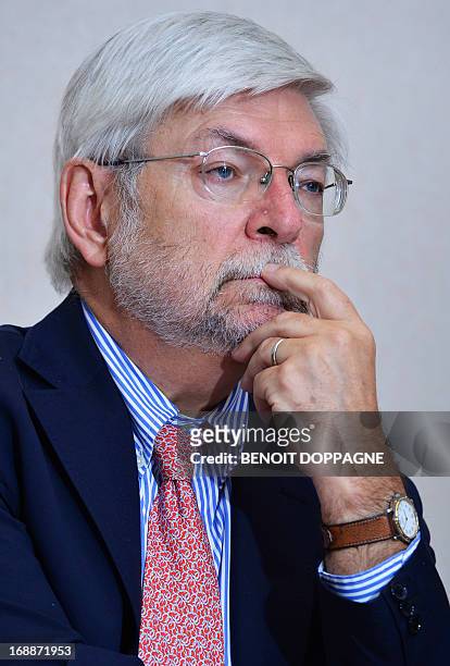Plan Commissioner Henri Bogaert looks on during a press conference by the Central Economic Council / Conseil Central de l'Economie / Centrale Raad...