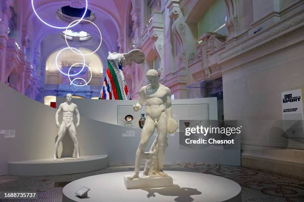 The plaster statue of an athlete holding a disc called the "Discophorus of Naucydes" is displayed during "Mode Et Sport, D'un Podium A L'Autre"...