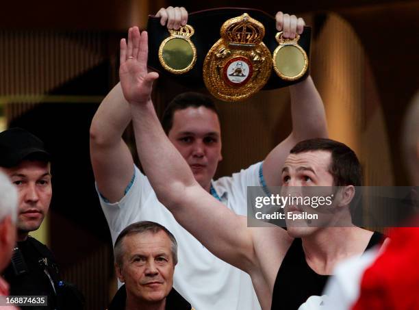 Denis Lebedev of Russia gestures during the official weigh-in for his fight against Guillermo Jones of Panama for the WBA cruiserweight title bout at...