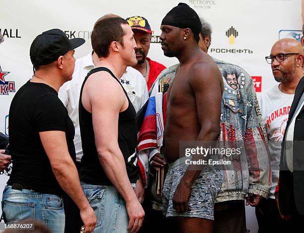 Denis Lebedev of Russia and Guillermo Jones of Panama face off during the official weigh-in for their WBA cruiserweight title bout at the...