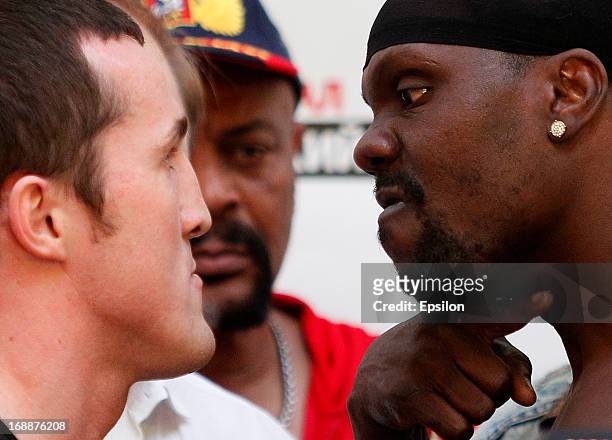 Denis Lebedev of Russia and Guillermo Jones of Panama face off during the official weigh-in for their WBA cruiserweight title bout at the...
