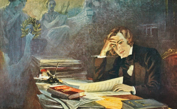 German composer Robert Schumann , composing the 'Dichterliebe' or 'Poet's Love', 1840. A copy of Goethe's 'Faust' lies on the desk in front of him,...