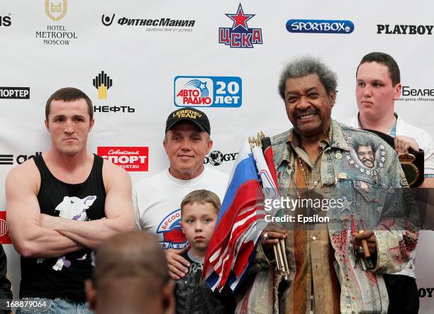 Denis Lebedev of Russia poses as promoter Don King looks on during the official weigh-in for his fight against Guillermo Jones of Panama for the WBA...