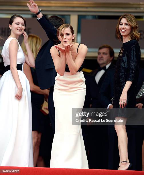 Actress Emma Watson blows a kiss as Katie Chang and Sofia Coppola look on prior to 'The Bling Ring' premiere during The 66th Annual Cannes Film...