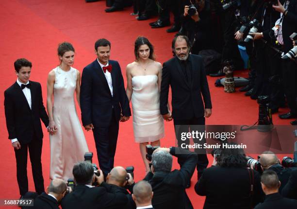 Actors Fantin Ravat, Marine Vacth, director Francois Ozon, actors Geraldine Pailhas and Frederic Pierrot attend the 'Jeune & Jolie' premiere during...