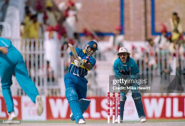 Sri Lankan cricketer Sanath Jayasuriya batting against England in a Cricket World Cup quarter final at at Iqbal Stadium, Faisalabad, Pakistan, 9th...